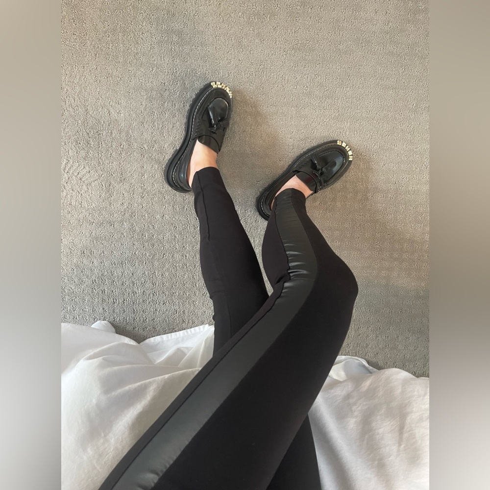 Black leggings with faux leather trim